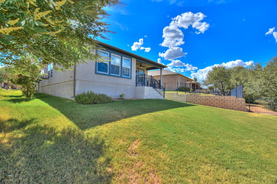 106 Kickapoo Creek Lane Georgetown, TX 78633 - Photo 30 of 33 a view of a house with a big yard