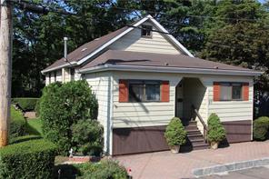 27 Ridgeland Terrace Rye, NY 10580 - Photo 1 of 1 a front view of a house with garden