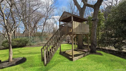 a view of a park with a slide