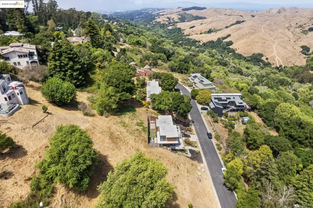 an aerial view of residential house with outdoor space