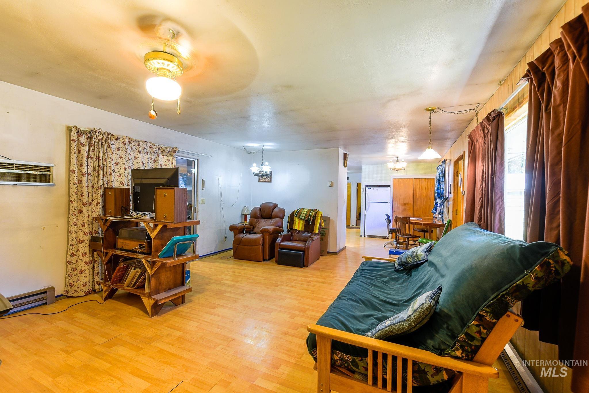 243 North Fir Street Genesee, ID 83832 - Photo 12 of 50 Living area with light wood finished floors