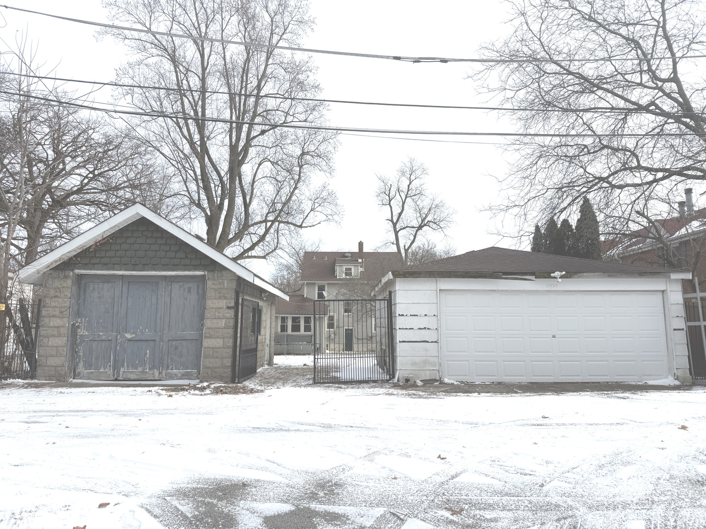 10228 South Prospect Avenue Chicago, IL 60643 - Photo 23 of 23 a front view of a house with a yard covered with snow in outdoor space