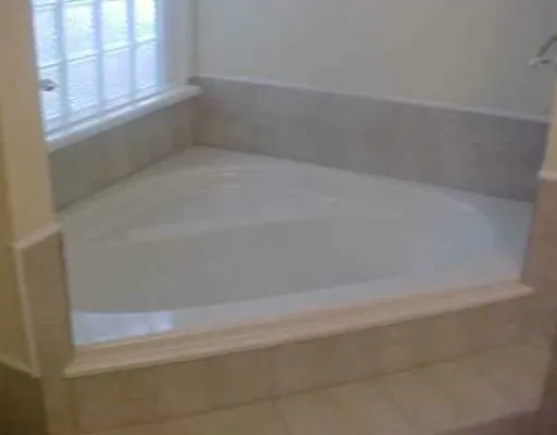 a close up of a bathtub