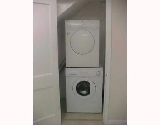 a close up view of a washer and dryer