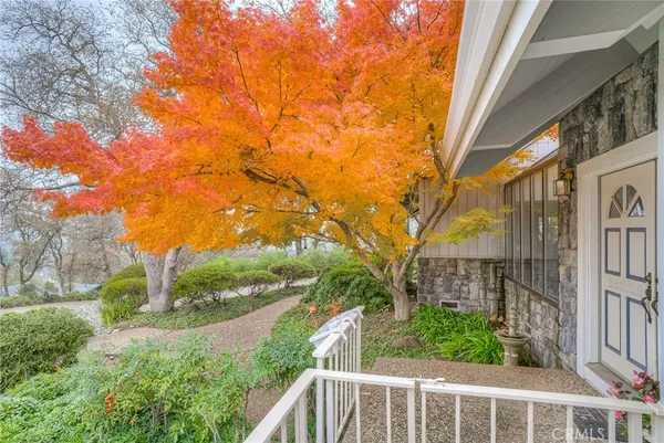 a view of a mountain range with trees in the background