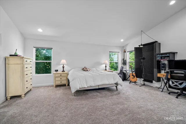 a bed room with a bed and furniture