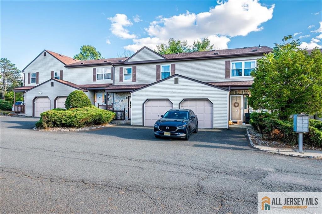 3003 Hana Road Edison, NJ 08817 - Photo 2 of 45 a view of a car parked in front of house