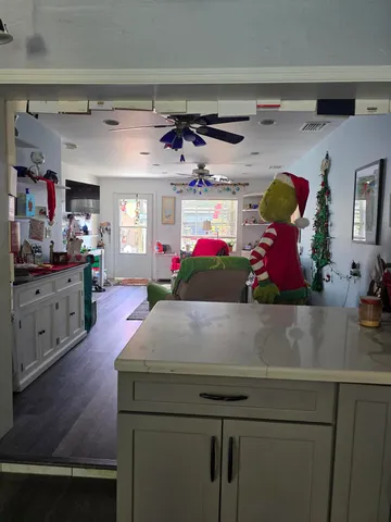 a bathroom with a toilet a sink and a mirror