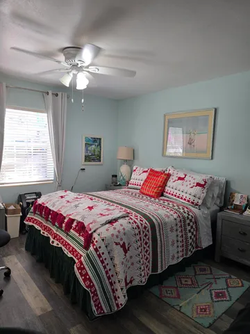 a kitchen with cabinets and window