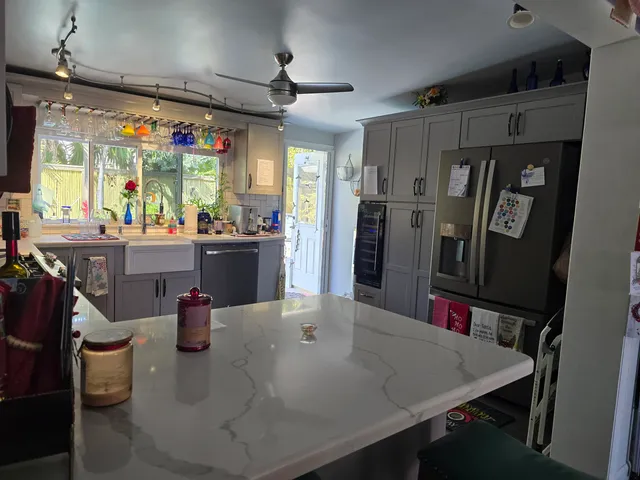 a living room with furniture and flowers