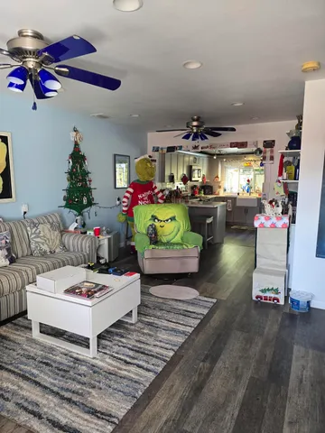 a room with furniture and a flat screen tv