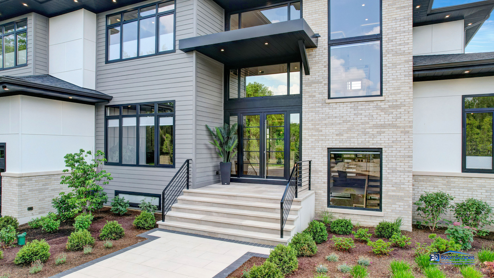 25 Rolling Hills Drive Barrington Hills, IL 60010 - Photo 2 of 127 a front view of a house with a garden