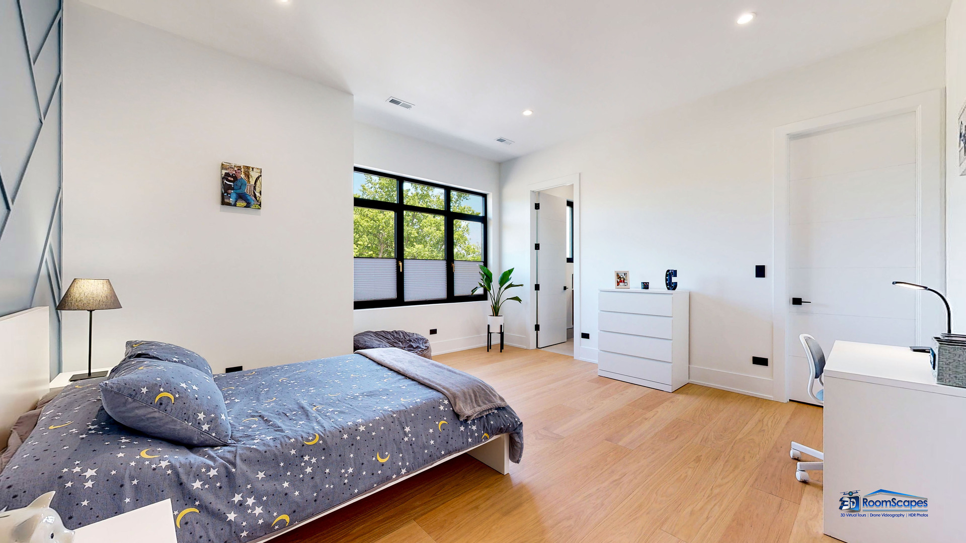 25 Rolling Hills Drive Barrington Hills, IL 60010 - Photo 51 of 127 a bedroom with a bed and a large window