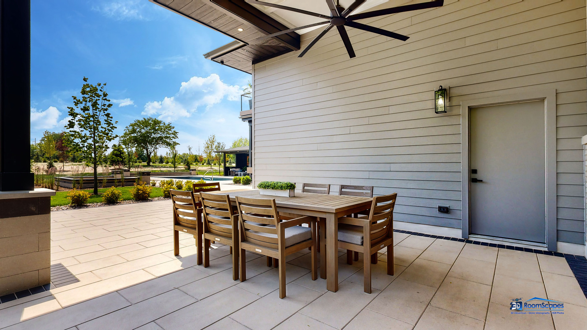 25 Rolling Hills Drive Barrington Hills, IL 60010 - Photo 94 of 127 a patio with a table and chairs and potted plants