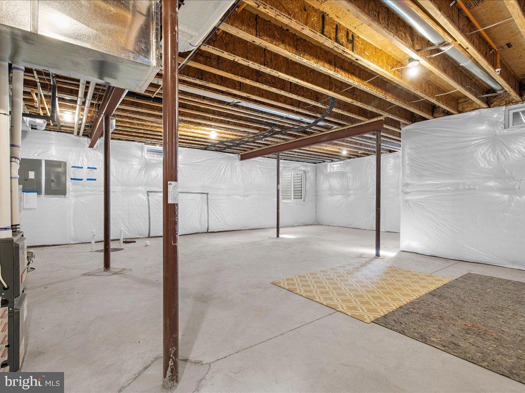 48 Kleis Road Severna Park, MD 21146 - Photo 62 of 84 Unfinished lower level with 9' ceilings & rough in