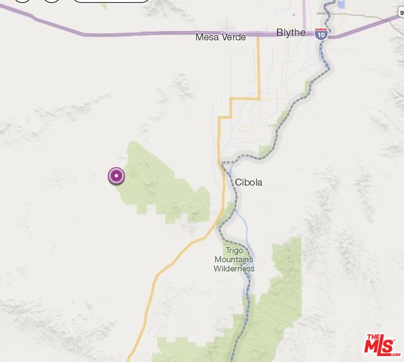 a bathroom with a sink and a shower curtain