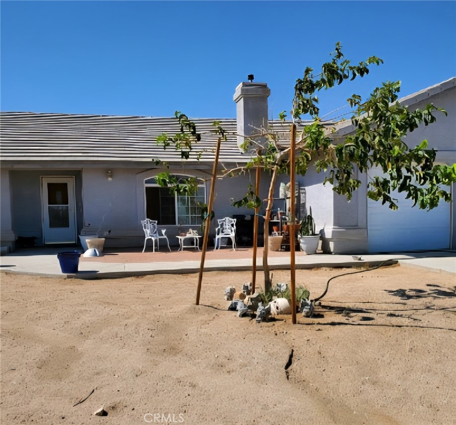5877 Goss Road Phelan, CA 92371 - Photo 2 of 3 a view of a house with basketball court