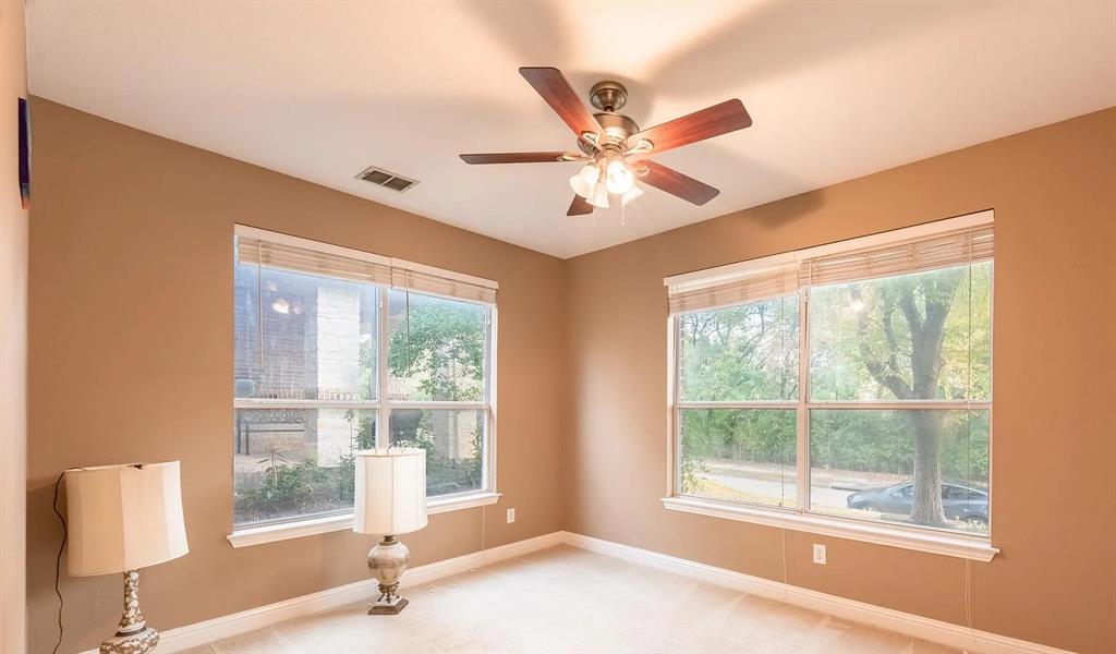 3829 Walnut Ridge Lane Plano, TX 75074 - Photo 12 of 18 a living room with furniture and a large window