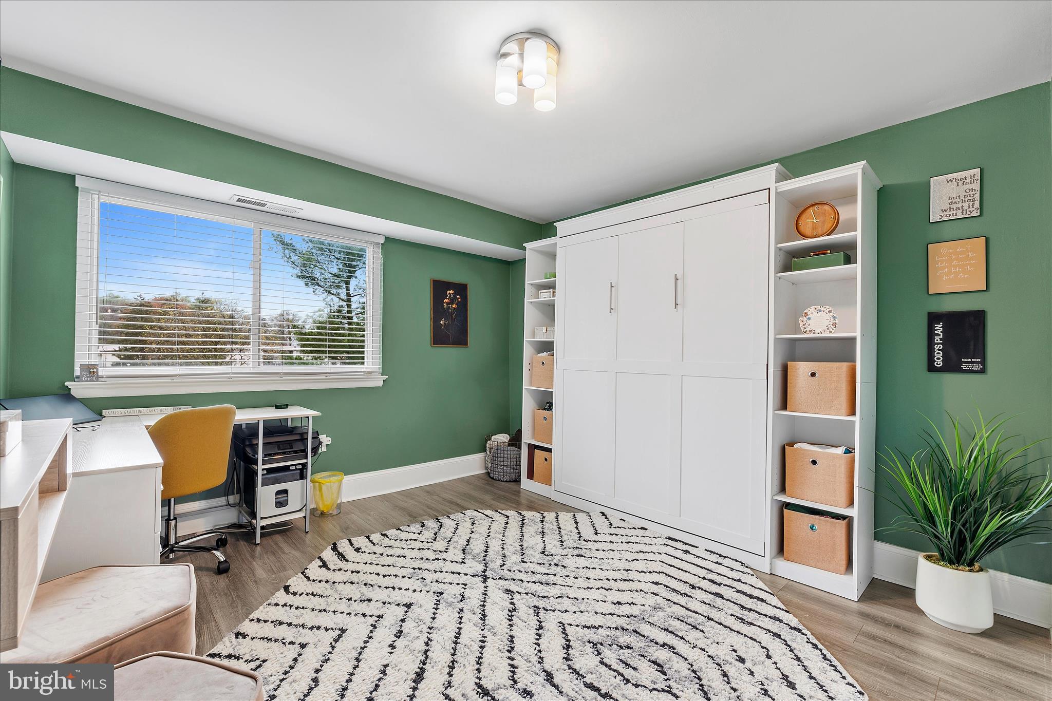11334 Cherry Hill Road, Unit 2J20 Beltsville, MD 20705 - Photo 21 of 39 a workspace with furniture hardwood and a window