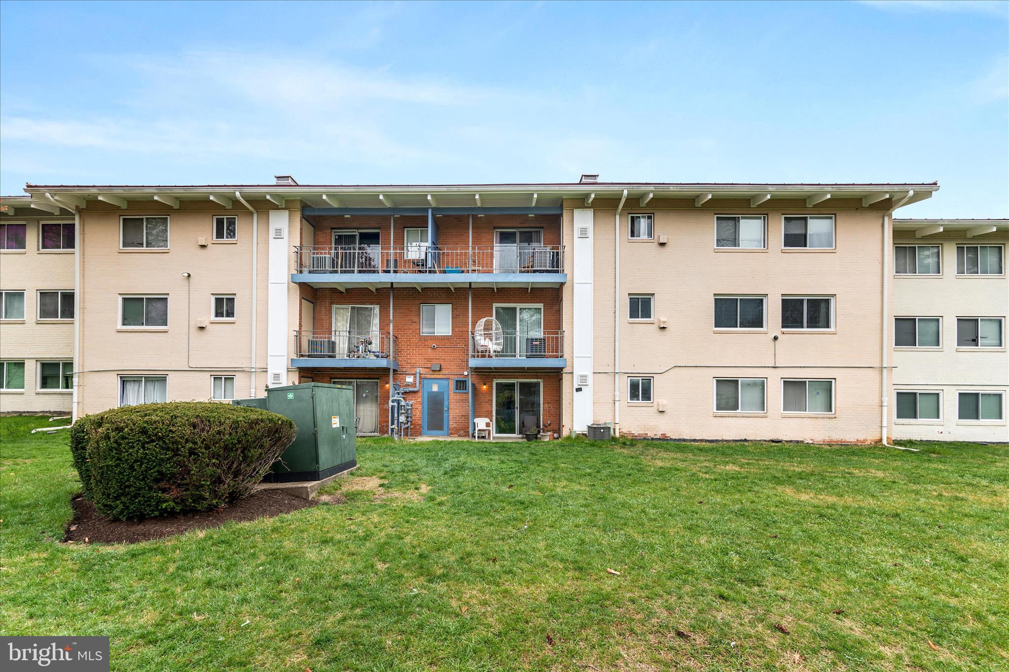 11334 Cherry Hill Road, Unit 2J20 Beltsville, MD 20705 - Photo 27 of 39 a front view of a building with glass windows and stairs