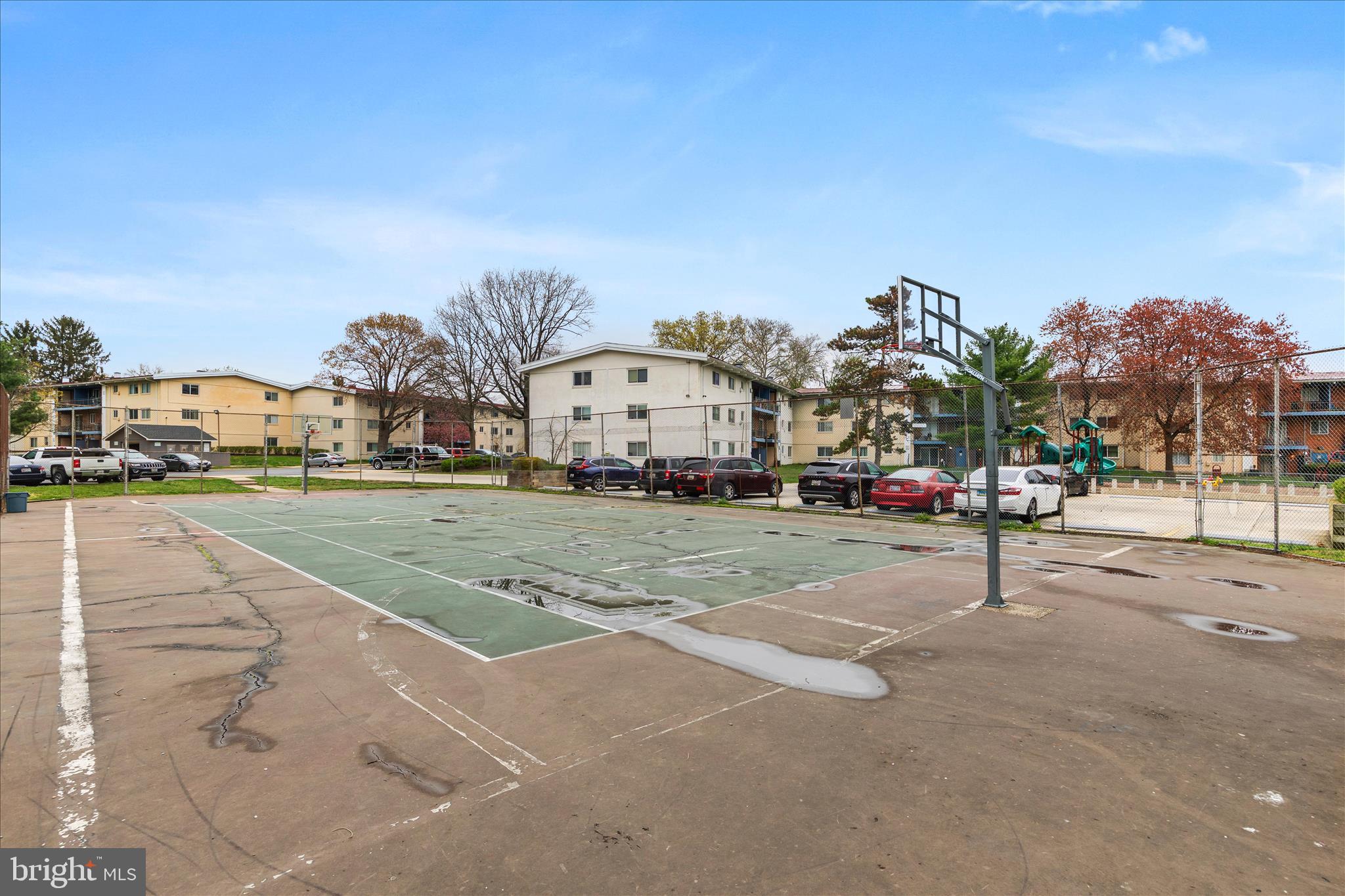 11334 Cherry Hill Road, Unit 2J20 Beltsville, MD 20705 - Photo 32 of 39 a swimming pool with outdoor seating and yard