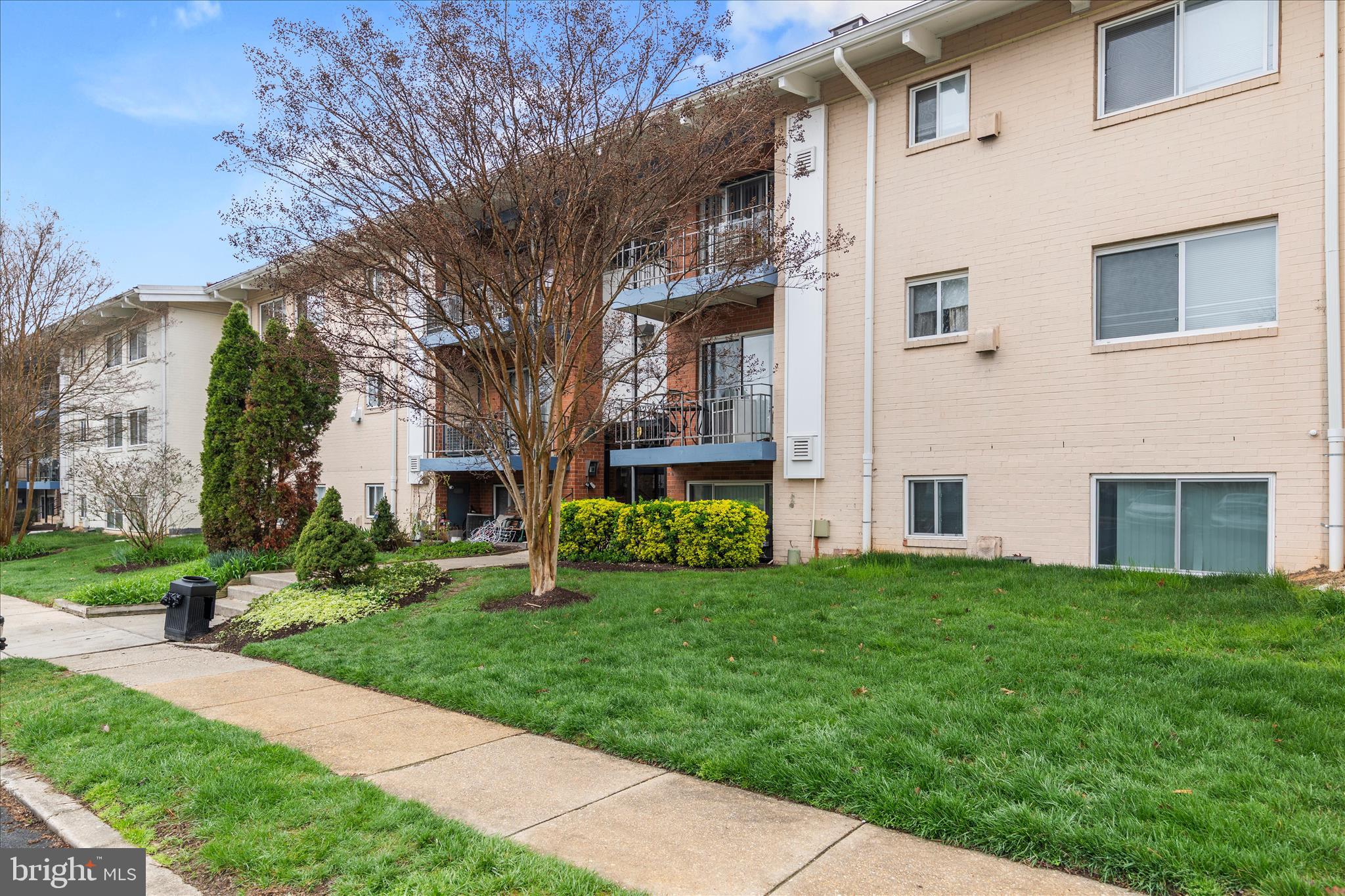 11334 Cherry Hill Road, Unit 2J20 Beltsville, MD 20705 - Photo 37 of 39 a view of a house with a yard