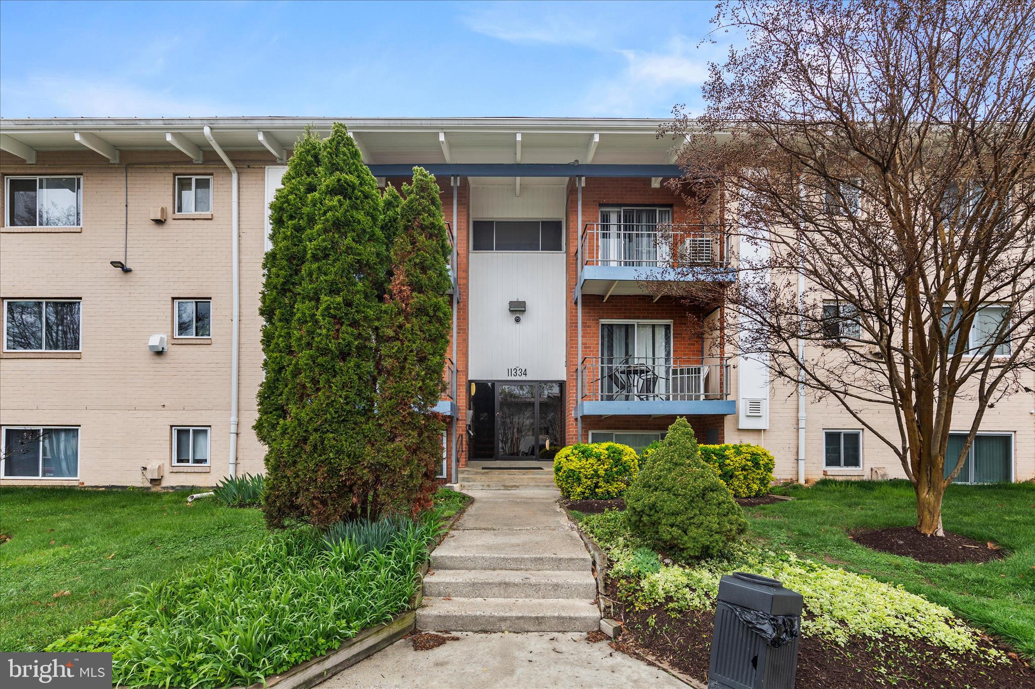 11334 Cherry Hill Road, Unit 2J20 Beltsville, MD 20705 - Photo 39 of 39 front view of a house with a yard