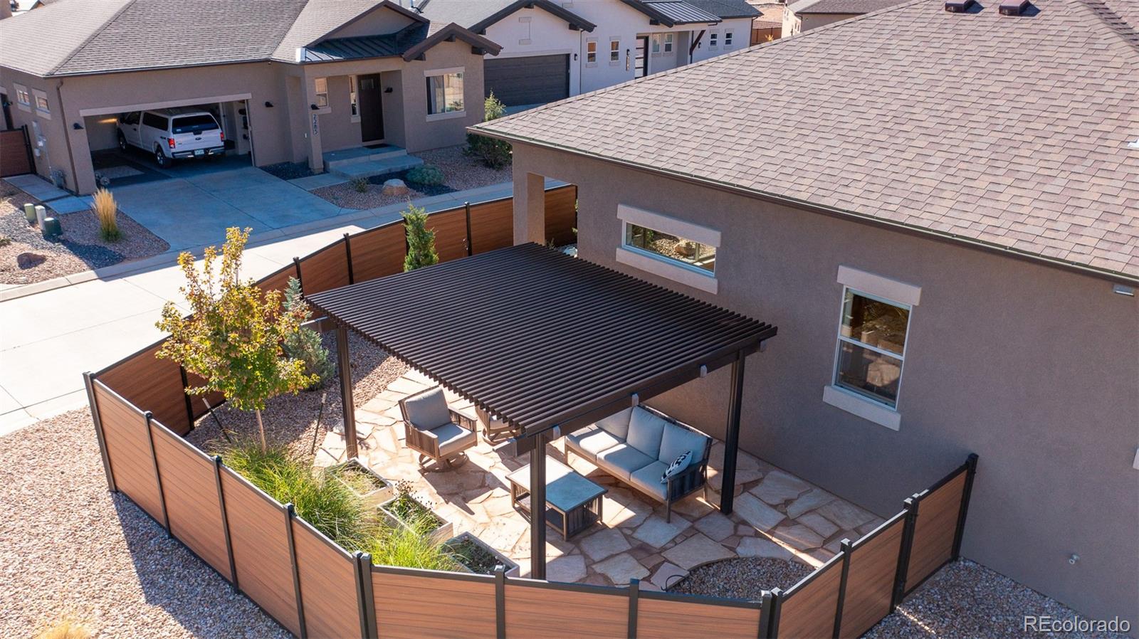 2287 Rock Valley Road Grand Junction, CO 81507 - Photo 27 of 32 a view of a couches and dinning table in the balcony