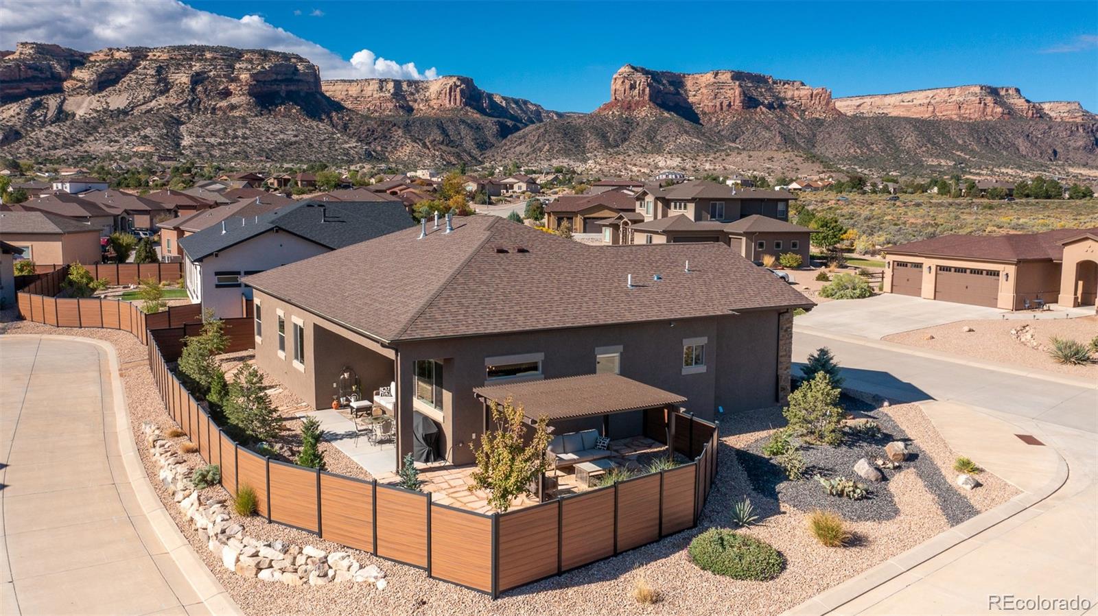 2287 Rock Valley Road Grand Junction, CO 81507 - Photo 30 of 32 an aerial view of a house with balcony and patio