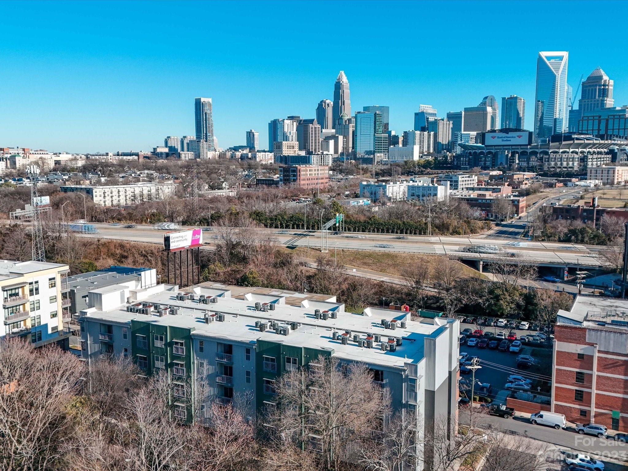 630 Calvert Street, Unit 307 Charlotte, NC 28208 - Photo 26 of 27 a city view with lot of high rise buildings
