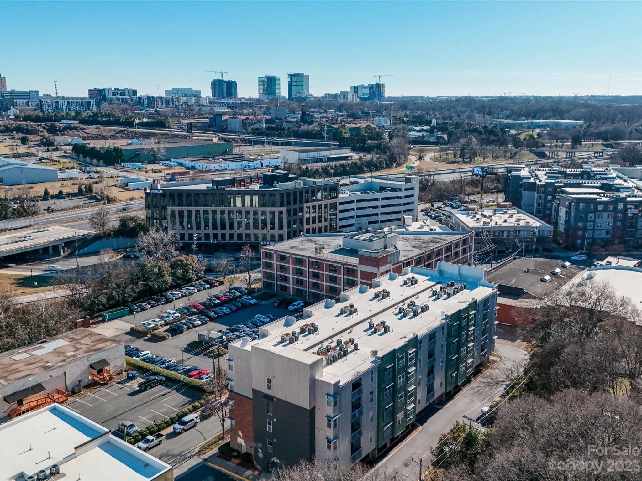 630 Calvert Street, Unit 307 Charlotte, NC 28208 - Photo 27 of 27 a city view with tall buildings
