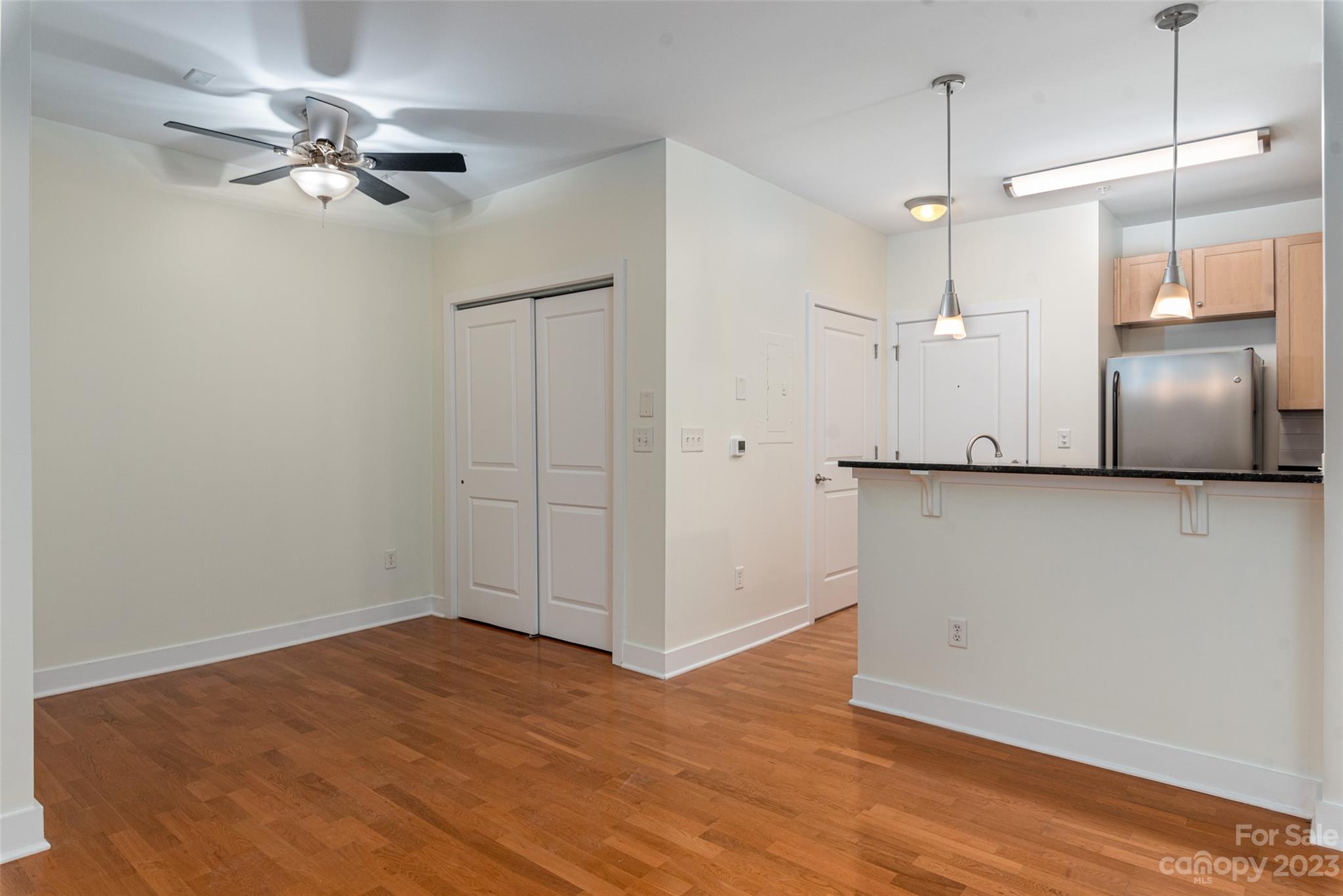 630 Calvert Street, Unit 307 Charlotte, NC 28208 - Photo 10 of 27 a view of a kitchen with a sink and dishwasher