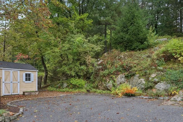 a view of a house with a tree