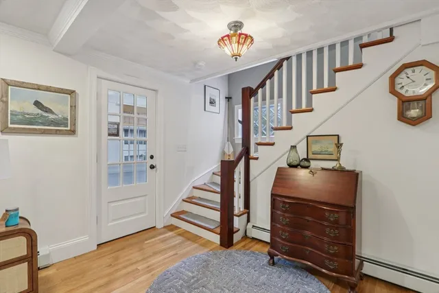 a view of entryway with livingroom and stairs