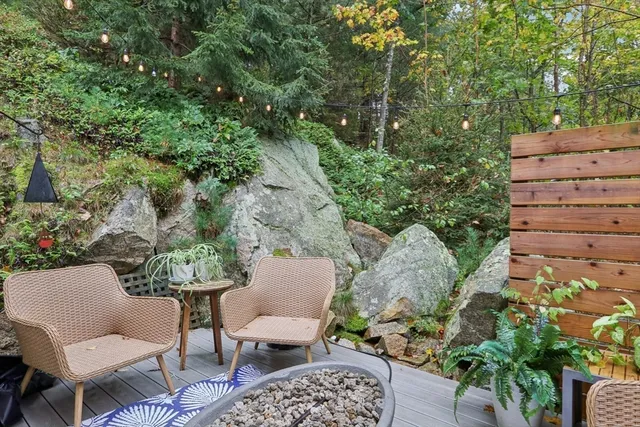 a outdoor living space with furniture and garden view