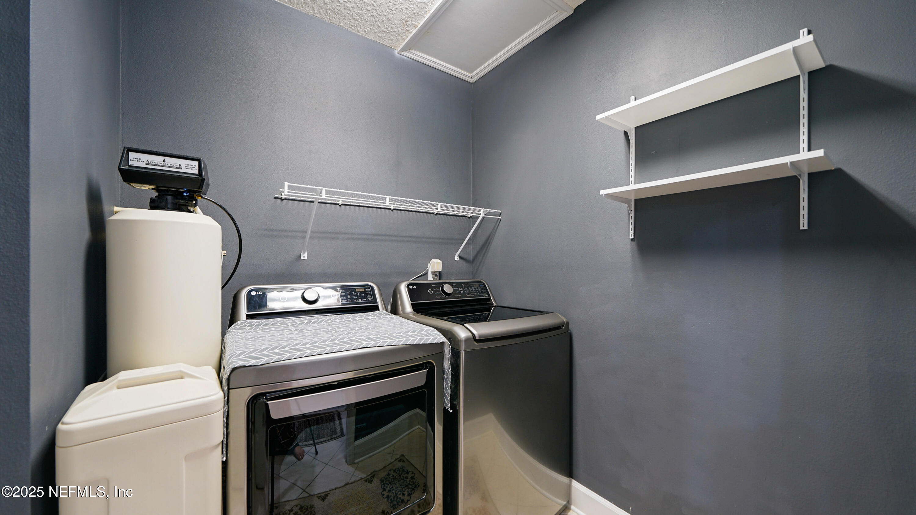 6127 Eclipse Circle Jacksonville, FL 32258 - Photo 15 of 37 a utility room with dryer and washer