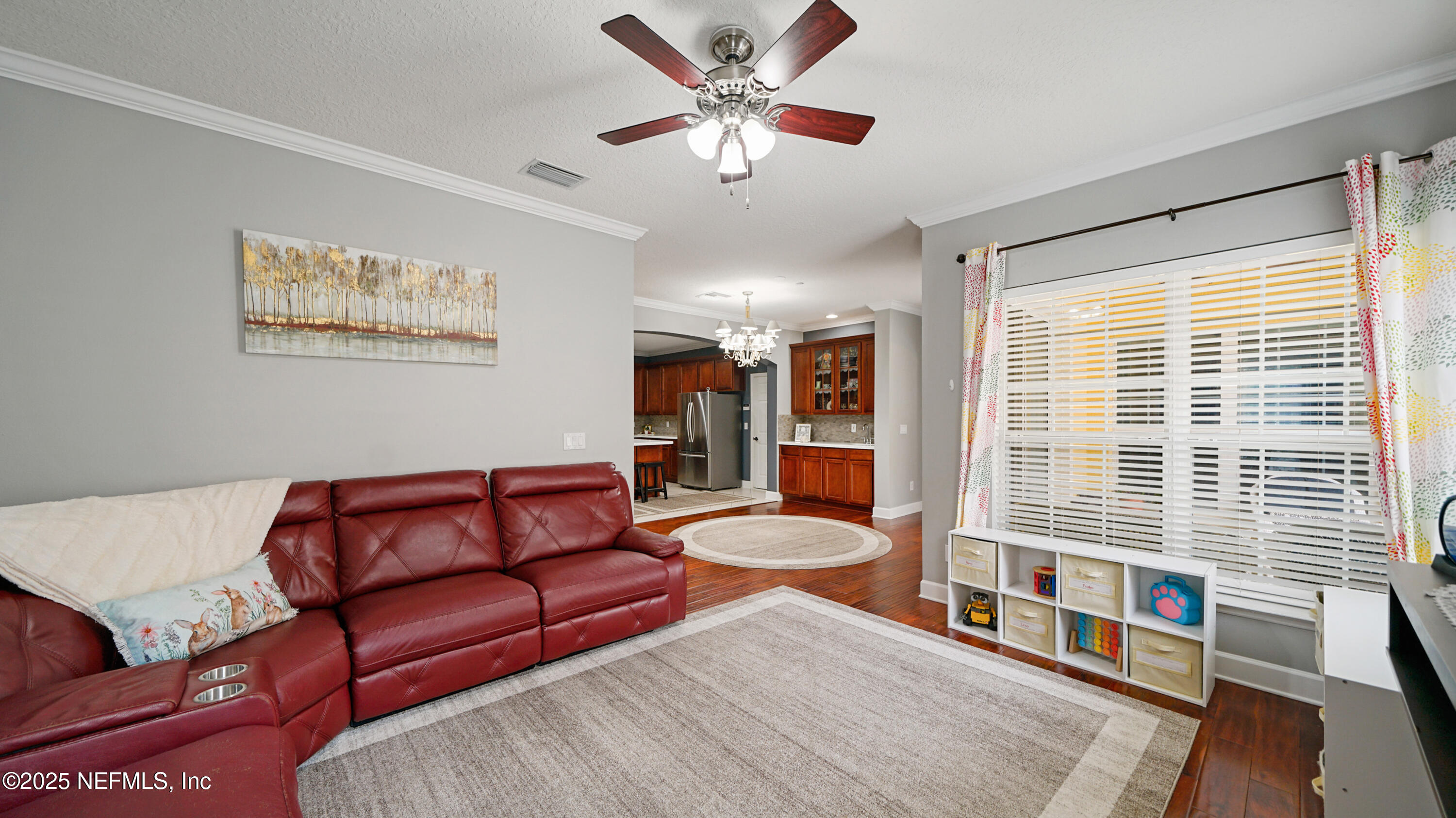 6127 Eclipse Circle Jacksonville, FL 32258 - Photo 8 of 37 a living room with furniture and a large window