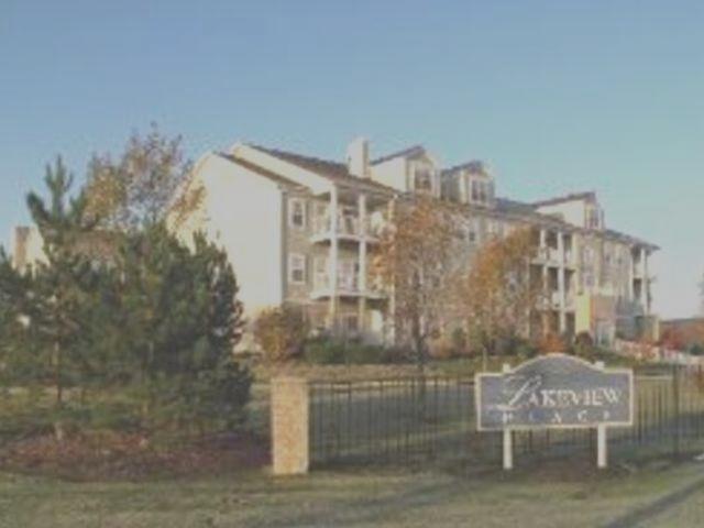 1259 West Lake Street, Unit 304 Addison, IL 60101 - Photo 2 of 43 a view of building with an outdoor space