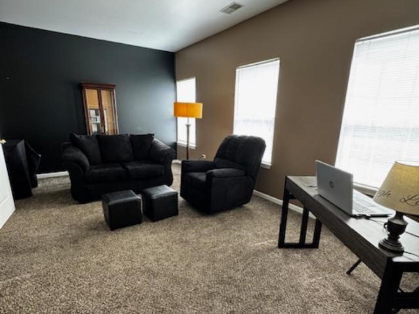 1259 West Lake Street, Unit 304 Addison, IL 60101 - Photo 40 of 43 a living room with furniture and a window