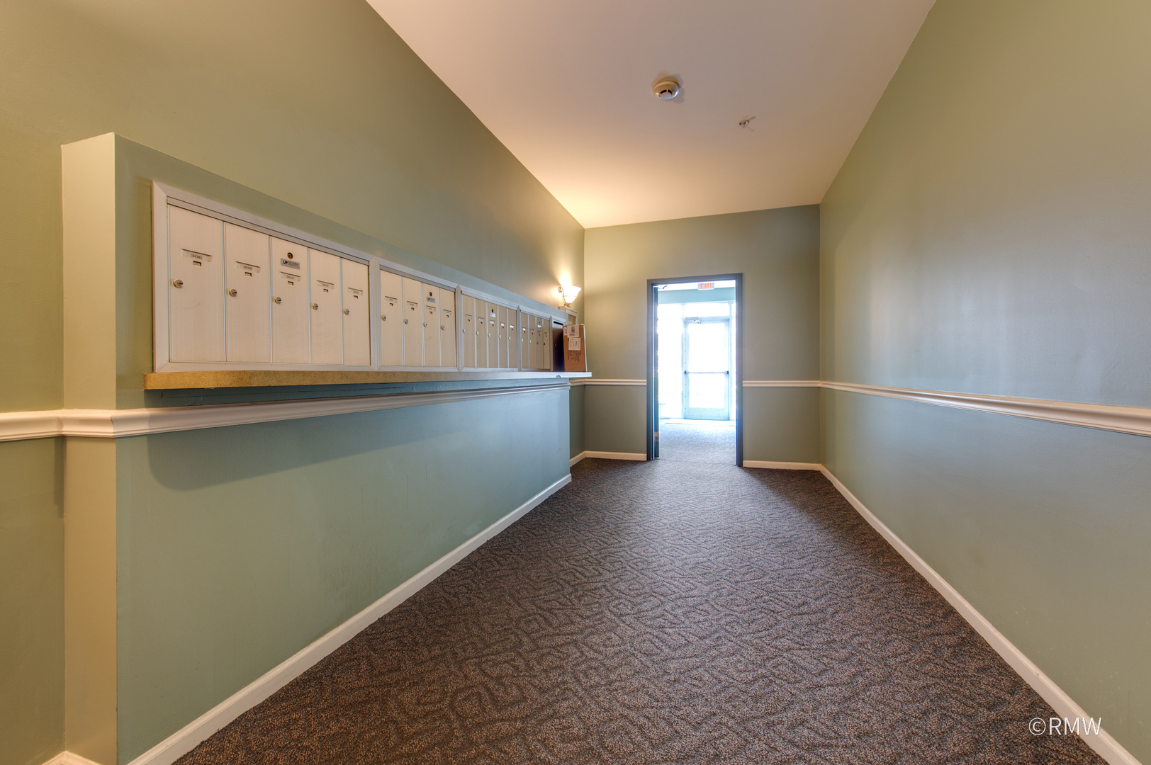 1259 West Lake Street, Unit 304 Addison, IL 60101 - Photo 9 of 43 a view of an empty room with window and wooden floor