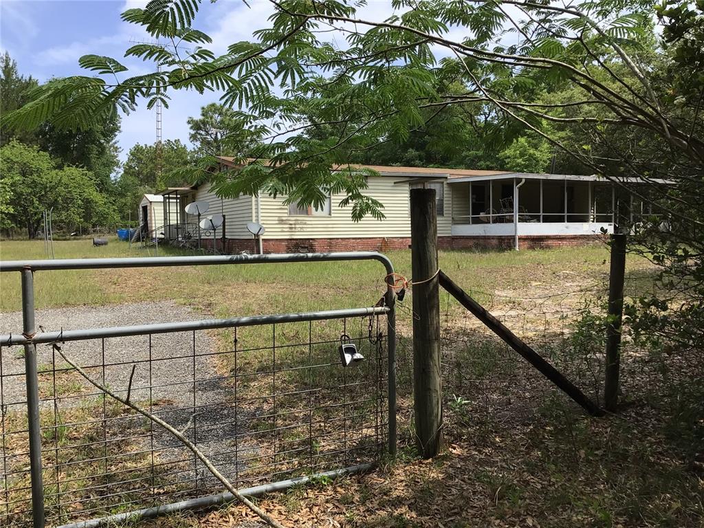 a view of a swimming pool with a deck
