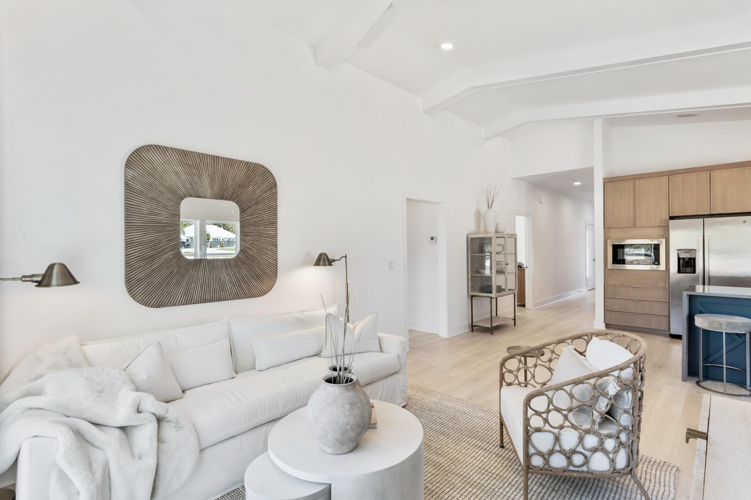 42 Asher St Inlet Beach, Unit LOT 37 Inlet Beach, FL 32461 - Photo 12 of 45 a living room with furniture and a table