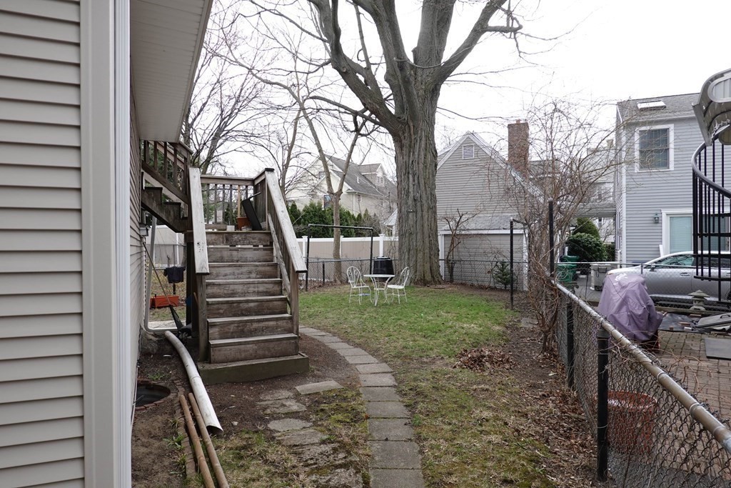 9 Crescent Square Newton, MA 02458 - Photo 4 of 12 a view of a house with backyard and trees