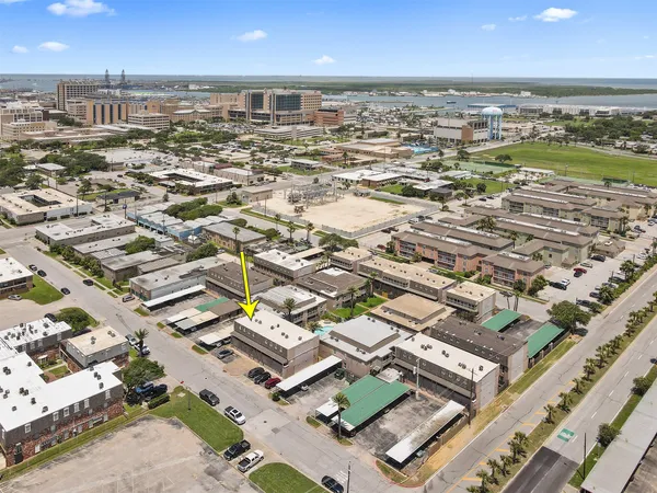 an aerial view of residential building with outdoor space