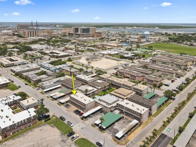 an aerial view of residential building with outdoor space