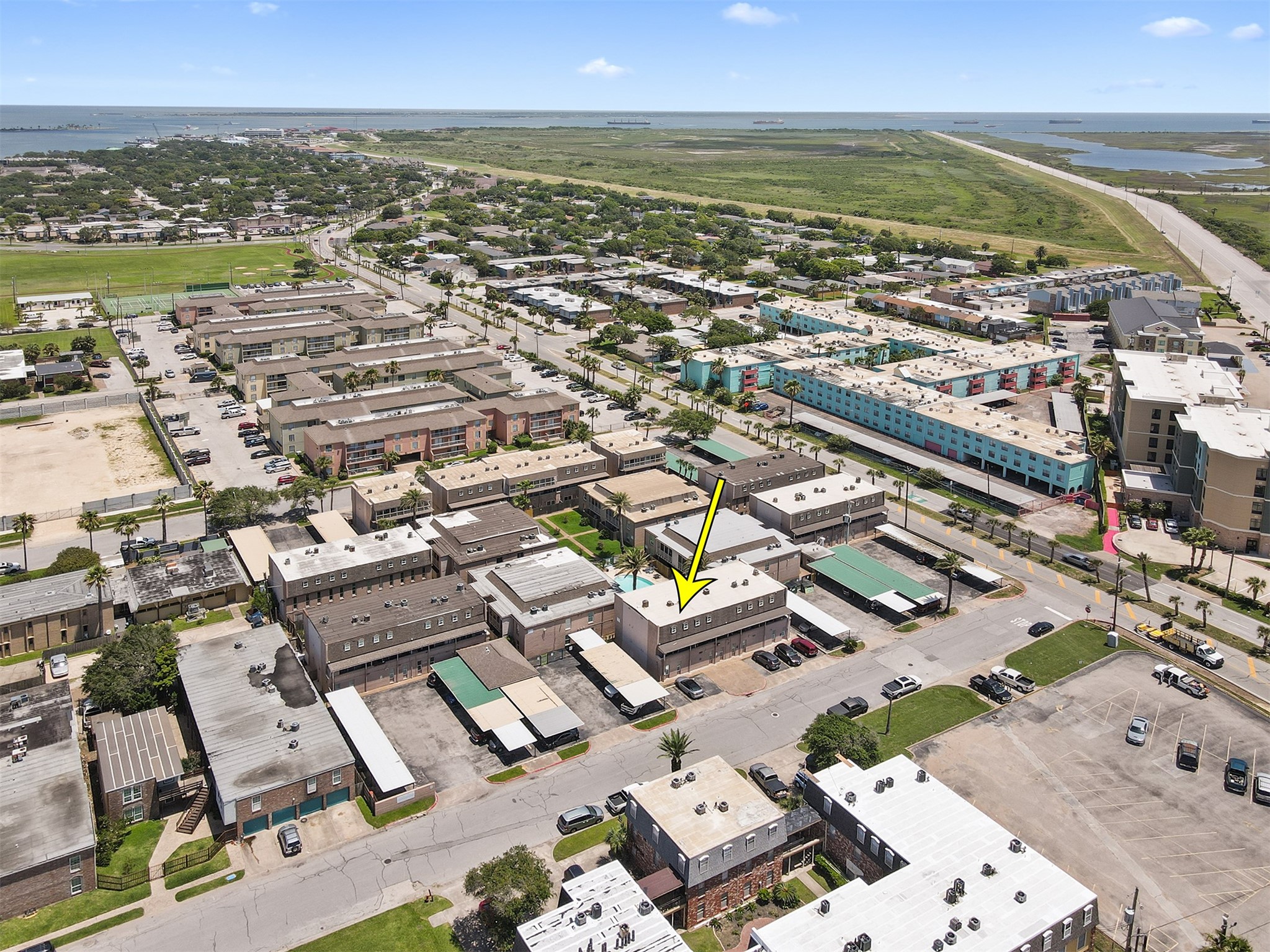 215 Postoffice Street, Unit 1208 Galveston, TX 77550 - Photo 18 of 19 an aerial view of residential building with outdoor space