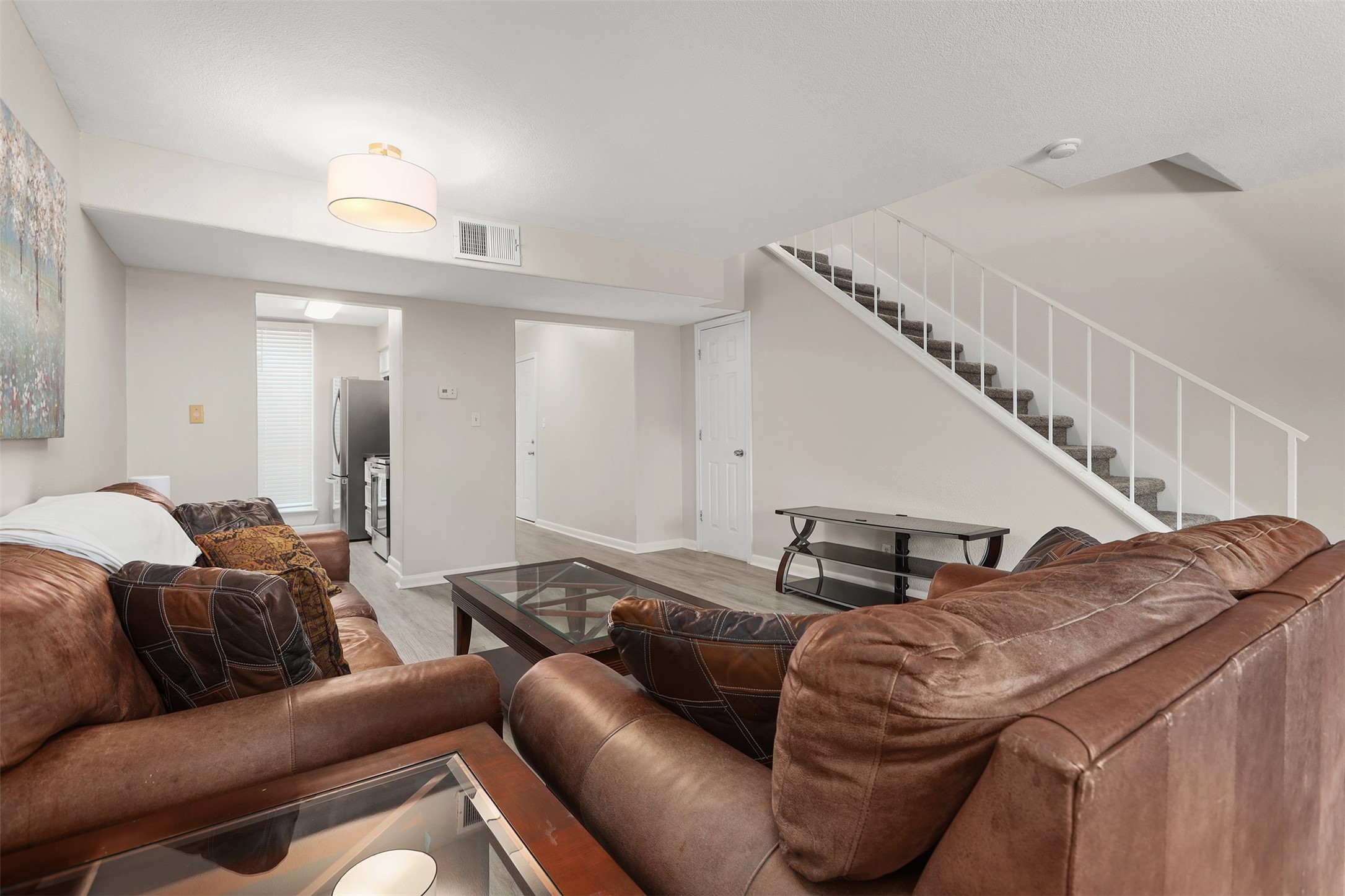 215 Postoffice Street, Unit 1208 Galveston, TX 77550 - Photo 4 of 19 a living room with furniture