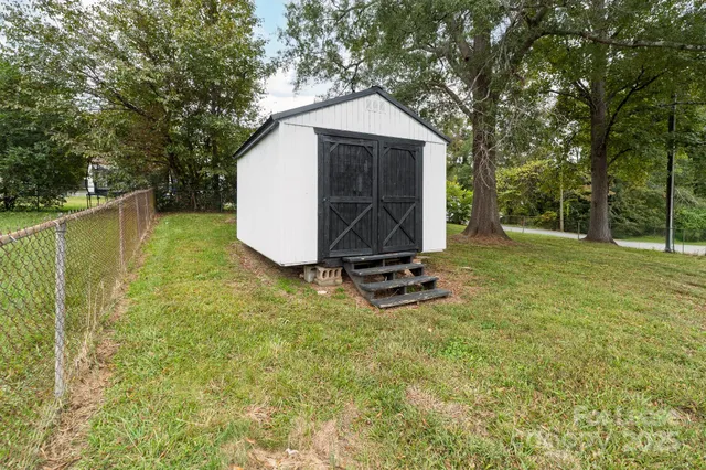 a view of a small space with wooden floor