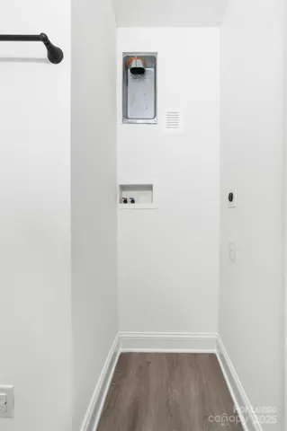 a bathroom with a sink toilet vanity and shower