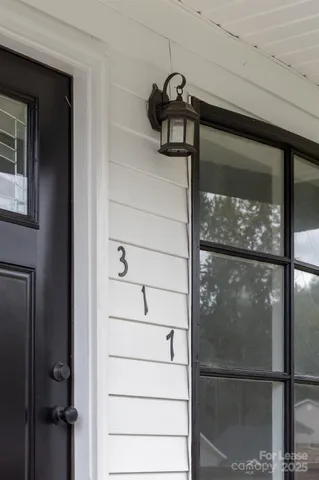 a view of balcony with wooden floor and fence
